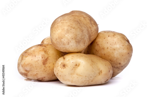 Group of potatoes isolated on white