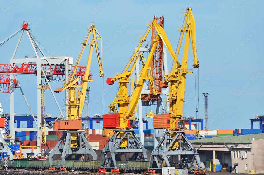 Cargo crane, freight traine and coal in port