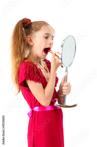 little girl in her mother's...