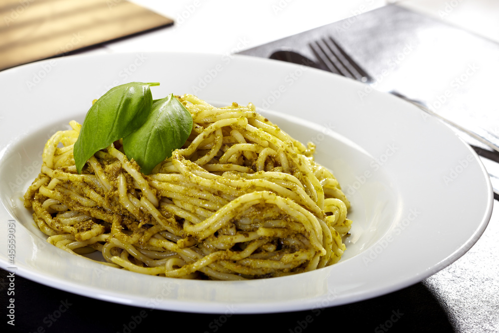 Spaghetti with pesto and basil