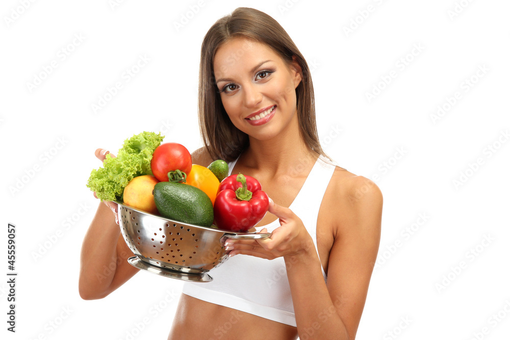 beautiful young woman with vegetables in colander, isolated beautiful young woman with vegetables in colander, isolated