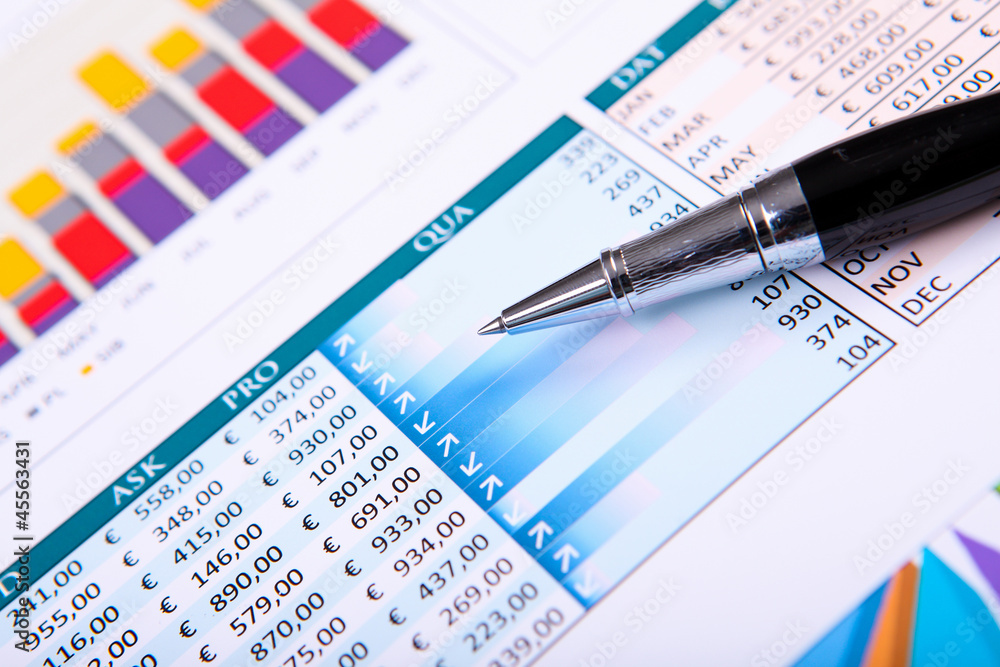 Financial papers on the table Financial papers on the table