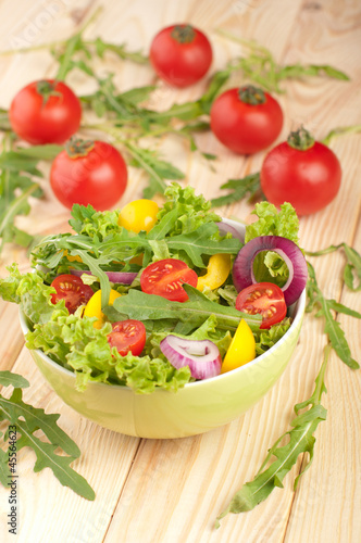 Fresh salad with tomatoes pepper and onions