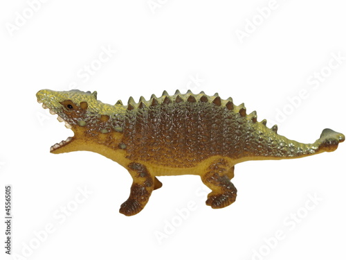 Toy plastic dinosaur isolated on white background