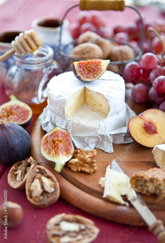 Cheese, bread and autumn fruit