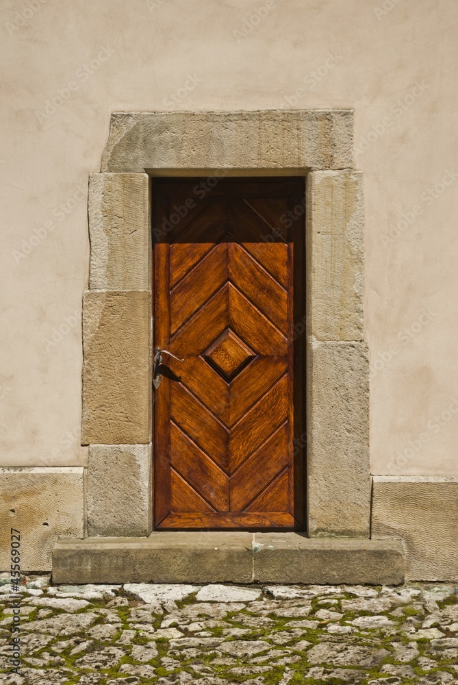 Fototapeta premium Old wooden door in castle