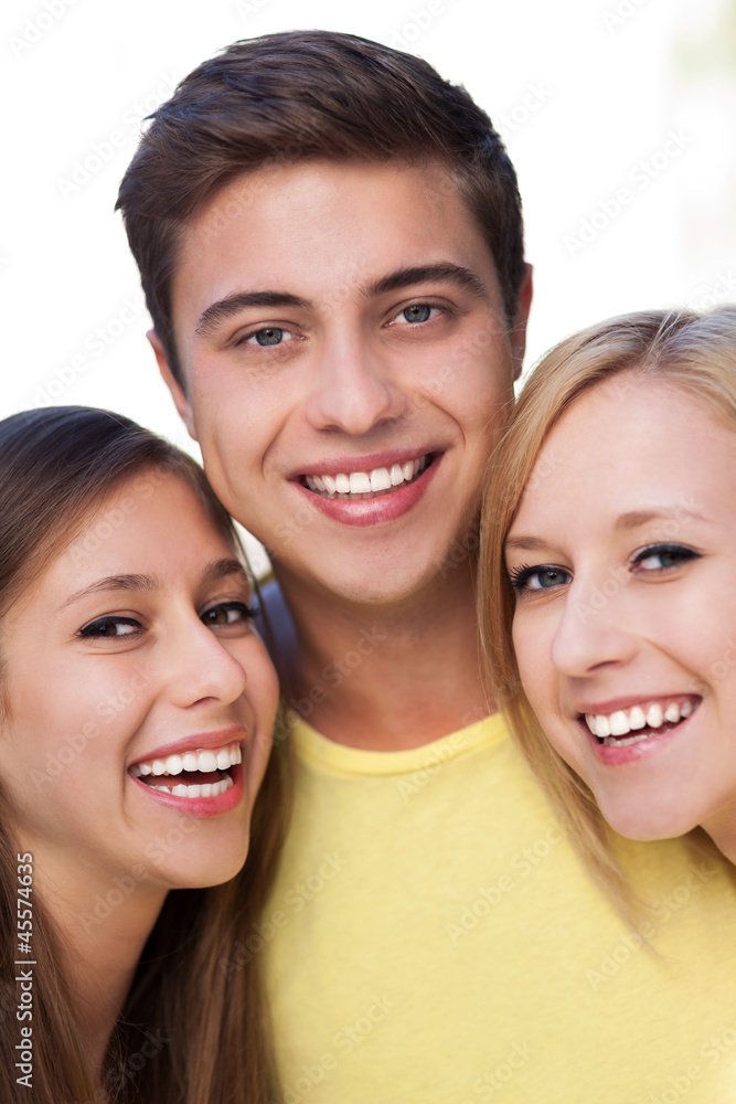 Young man with two female friends Young man with two female friends