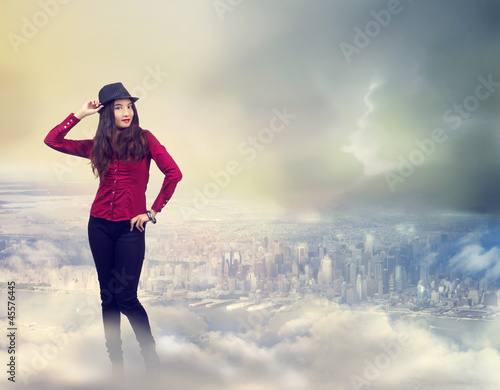Happy Woman Standing on the Clouds