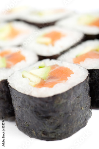 Delicious maki sushi rolls, isolated on white