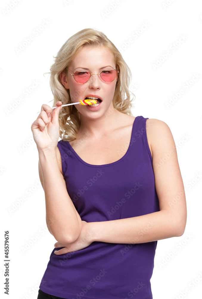 Woman in heart shaped glasses with lollypop, isolated on white