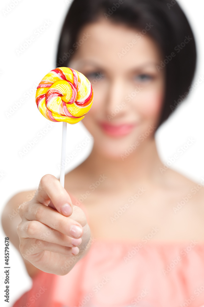 Woman offers sweet, isolated on white