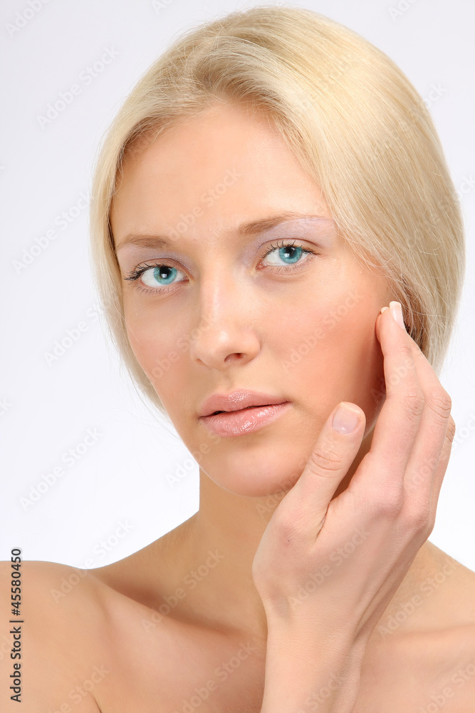 Closeup portrait of a beautiful woman touching Closeup portrait of a beautiful woman touching