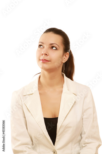 A pensive businesswoman looking up