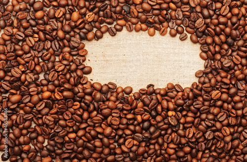 Old burlap and coffee beans background