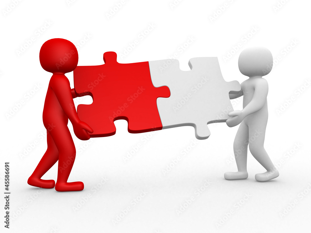 Two person matching puzzle pieces Two person matching puzzle pieces