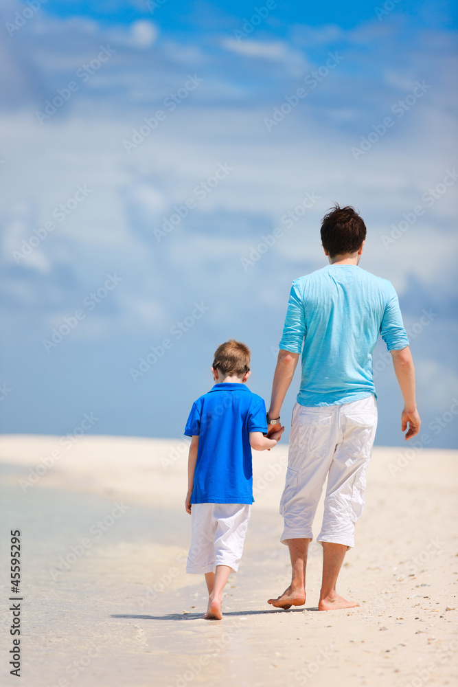 Father and son on a beach