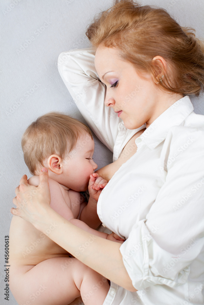 beautiful mother breast feeding her baby boy beautiful mother breast feeding her baby boy