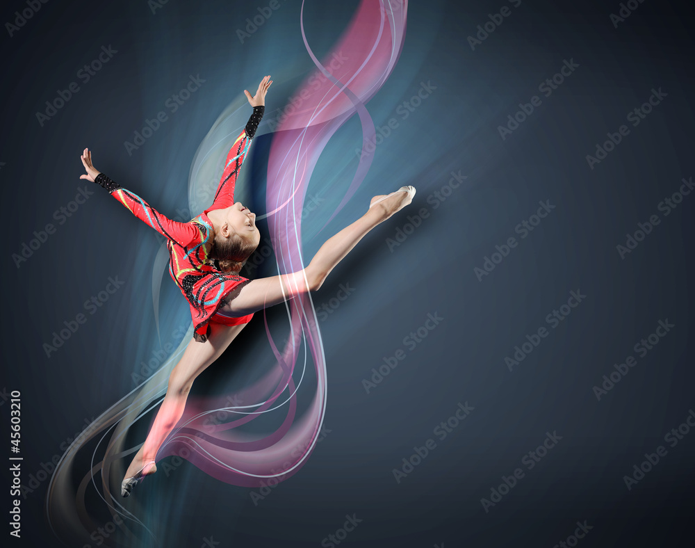 Obraz premium Young woman in gymnast suit posing