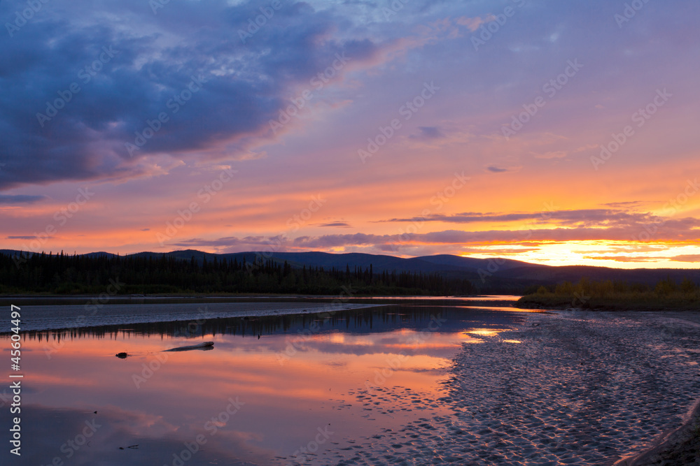 Beautiful sunset over Yukon River near Dawson City
