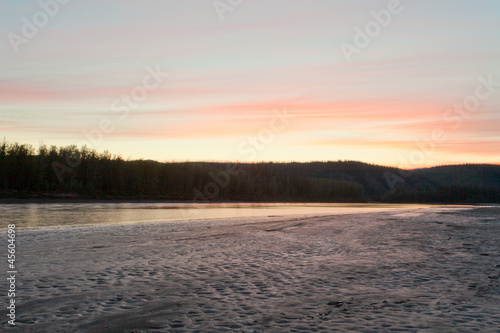 Sunset twilight over taiga at Yukon River, Canada