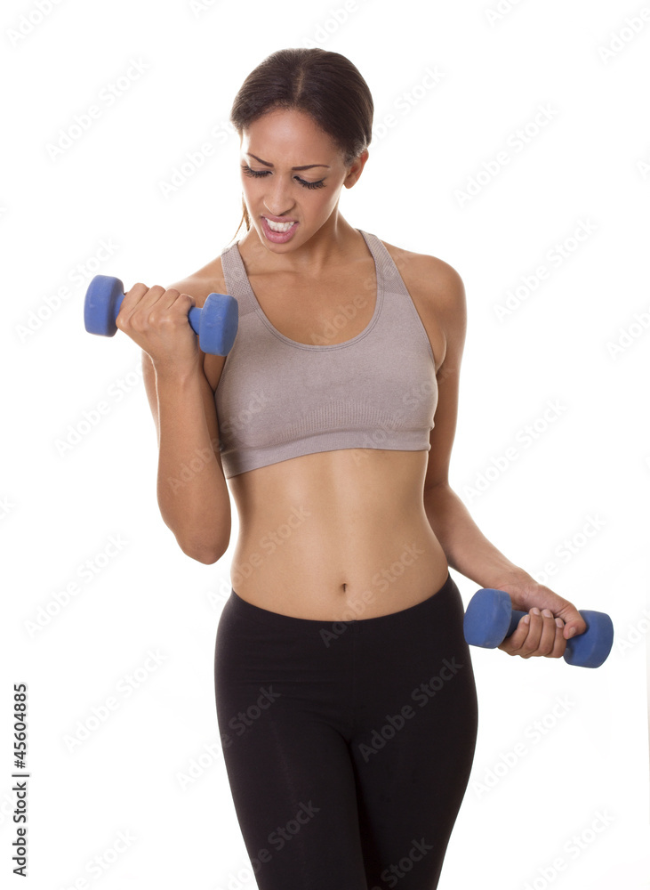 Woman struggles with weight during intense workout. Woman struggles with weight during intense workout.