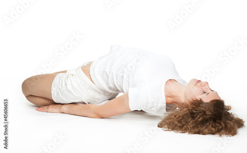 Sporty young woman training on the floor