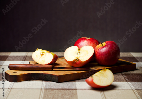 Red apples against dark background