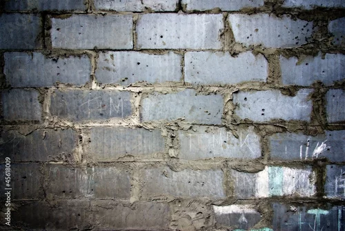 Fototapeta samoprzylepna Cegły bloki z cementową teksturą