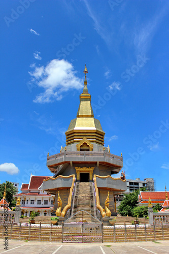 Thai Buddhist pagoda with blue sky background
