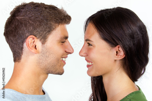 happy young couple looking at each other 