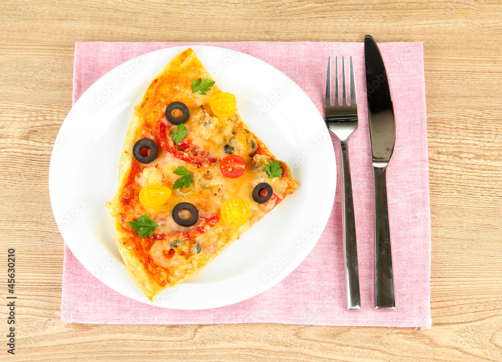 plate with a slice of delicious pizza on wooden background plate with a slice of delicious pizza on wooden background