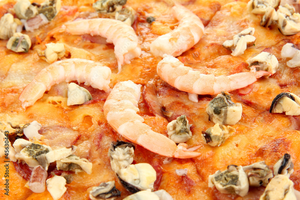 Delicious pizza with seafood close-up Delicious pizza with seafood close-up