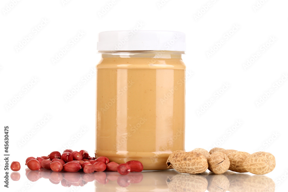 Delicious peanut butter in jar of peanut near isolated on white Delicious peanut butter in jar of peanut near isolated on white