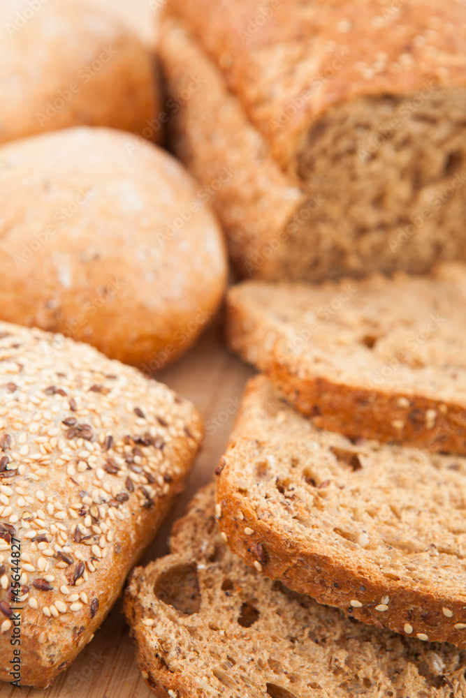Wholemeal bread lying on the background Wholemeal bread lying on the background
