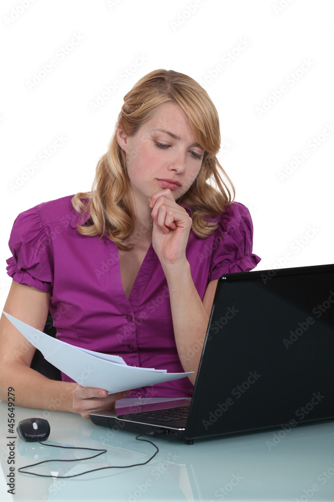 Blond office worker hard at work Blond office worker hard at work
