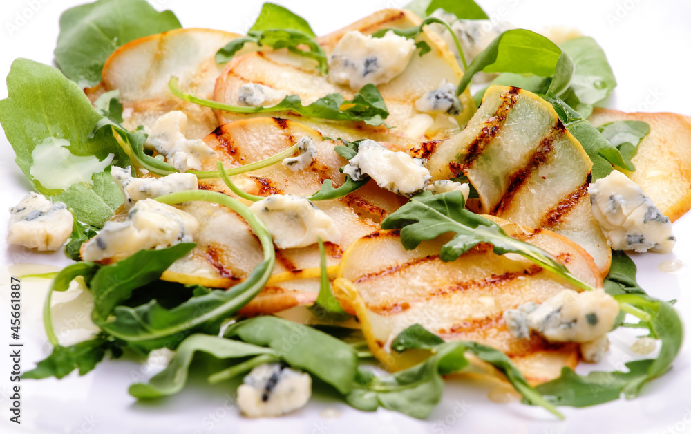 Salad with grilled pears, arugula and blue cheese Salad with grilled pears, arugula and blue cheese