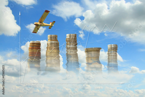 Coins, Growth Diagram, Plane Against the Sky