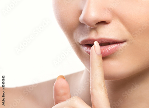 closeup portrait of woman's asking for silence