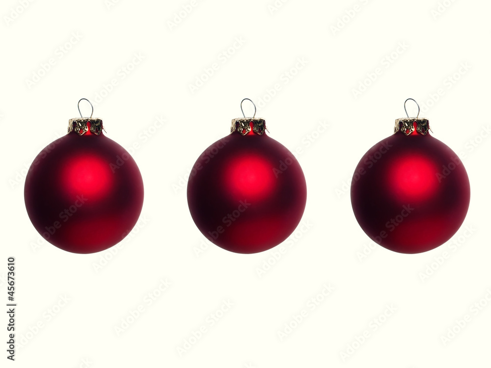 Three red Christmas baubles - isolated Three red Christmas baubles - isolated