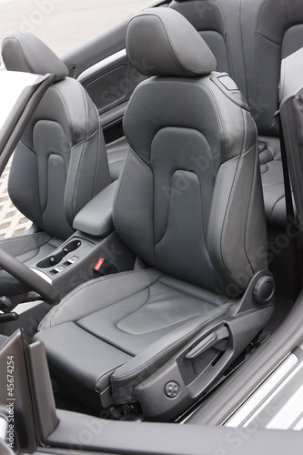 Convertible sportscar black leather seats © Luis Viegas