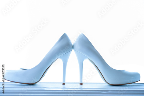 wedding shining shoes with a high heel on white backgrounds