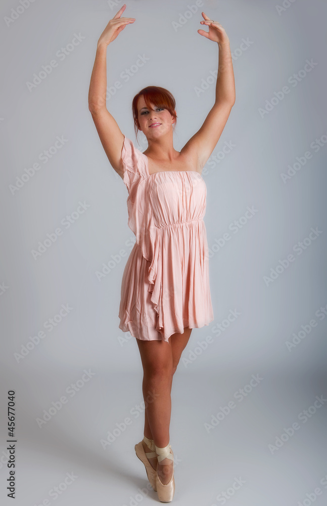 Pretty young female dancer with red hair Pretty young female dancer with red hair