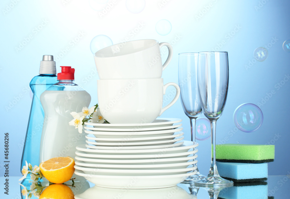 empty clean plates, glasses and cups with dishwashing liquid, empty clean plates, glasses and cups with dishwashing liquid,