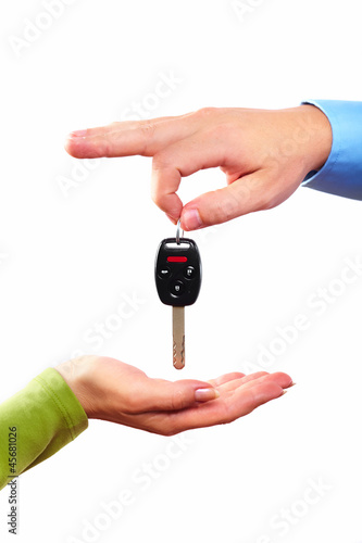 Hand with a car key.