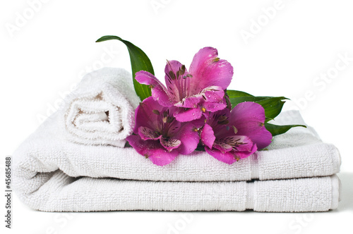 resources for spa, white towel and flower