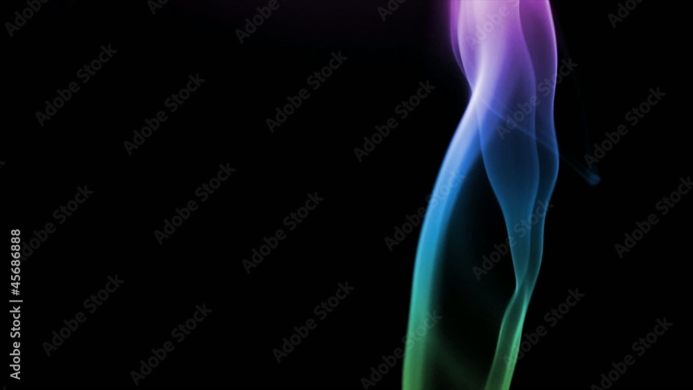 Fumée colorée sur fond noir Fumée colorée sur fond noir