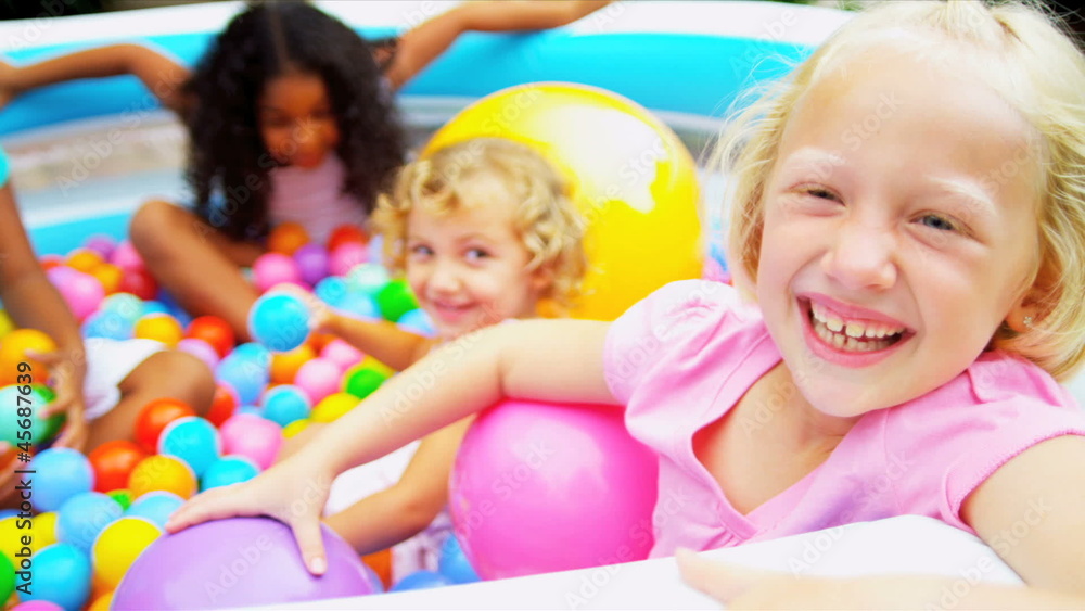 Laughing Little Girls Playing Plastic Balls Laughing Little Girls Playing Plastic Balls