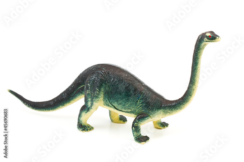 Toy plastic dinosaur on white baclground © noomhh