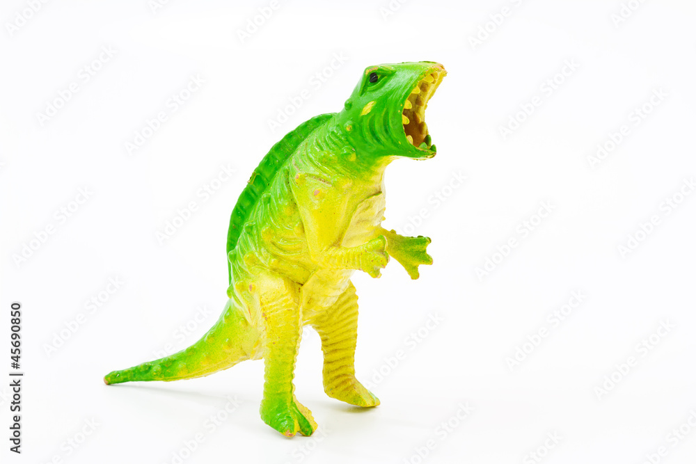 Fototapeta premium Toy plastic dinosaur on white baclground