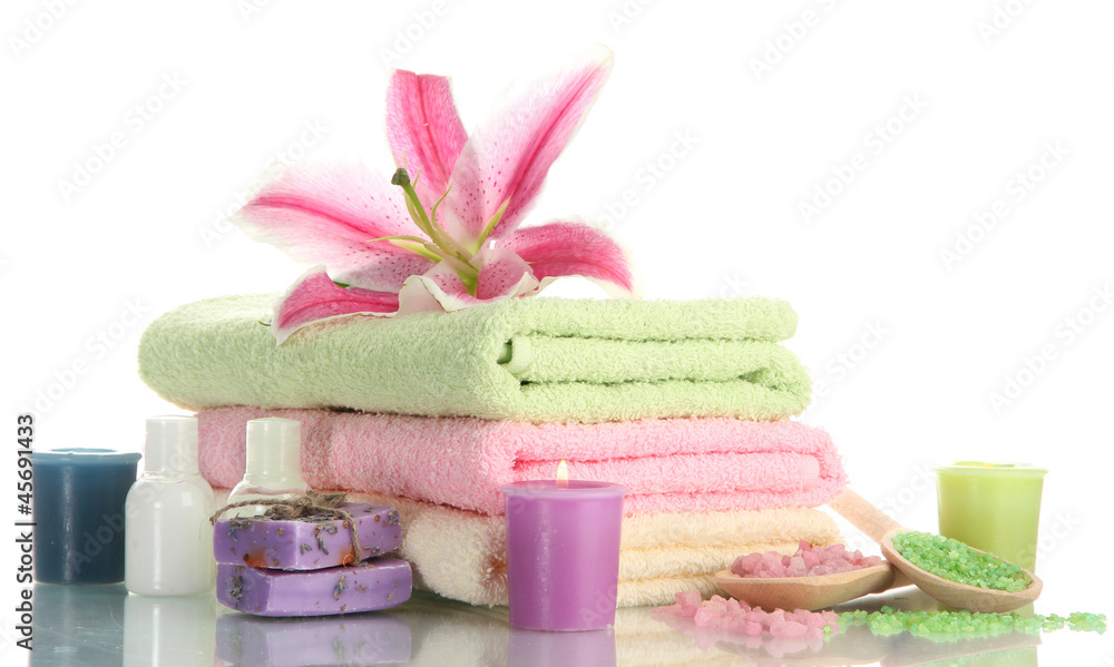 towels with lily, aroma oil, candles, soap and sea salt towels with lily, aroma oil, candles, soap and sea salt